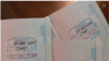 Tres pasaportes cubanos con estampas de Inmigración de parole humanitario.