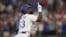El cubano Adolis García, de los Rangers de Texas, festeja luego de conectar un jonrón de tres carreras en el tercer juego de la serie divisional de la Liga Americana ante los Orioles de Baltimore, el martes 10 de octubre de 2023. (AP Foto/Julio Cortez)